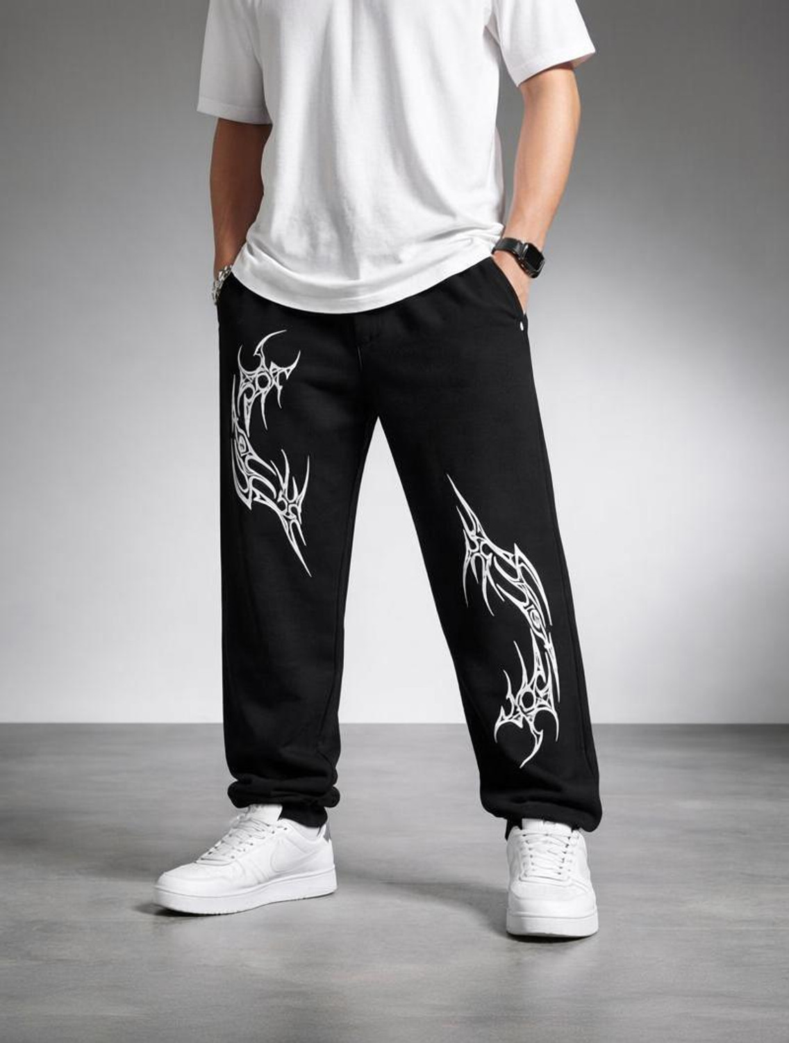 Toura Men & Women Black Graphic Track Pants - Image 1