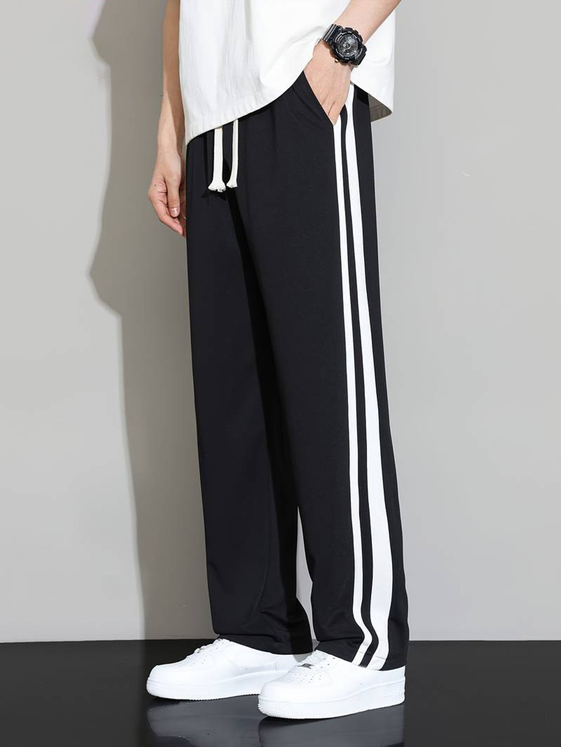 Paralians Men Striped Black Track Pants - Image 1