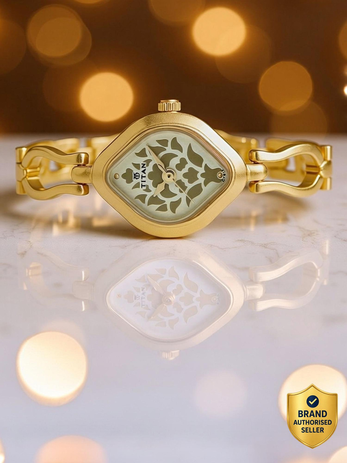 Titan Karishma Champagne Dial Gold Stainless Steel Strap Analog Watch - For Women NT2536YM03,NU2536YM03 - Image 1
