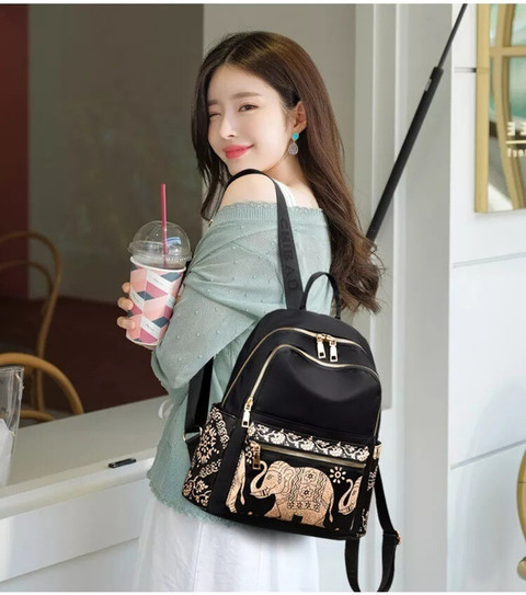 girl with mini backpack Vera Bradley in Hydrangea Pink Fans of The Cheetah Girls will love the Loungefly Mini Backpacka compact NUWA Mini Backpack Purse for