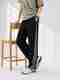 Adokedo Men Solid Beige Track Pants - Image 2