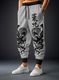 RASKELYBAX Men Printed Black Track Pants - Image 4