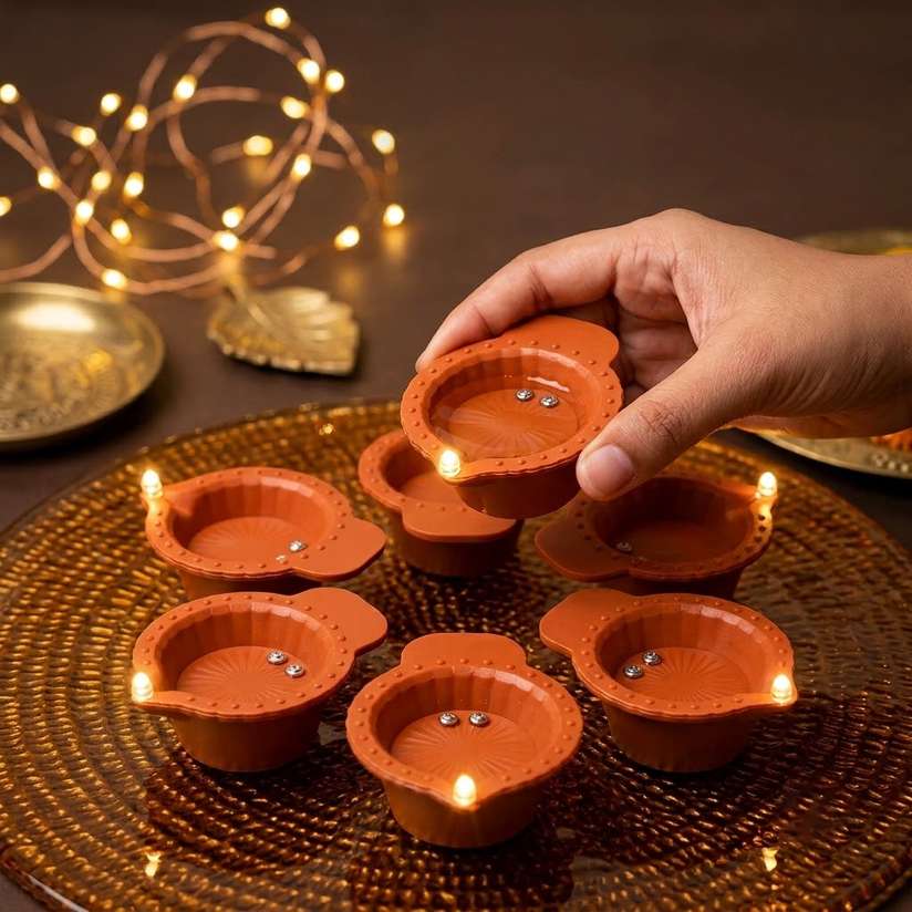BE UNIQUE Water Sensor LED Diya Set Ultra Bright Decorative Diyas for Festivals Plastic (Pack of 24) Table Diya Price in India - Buy BE UNIQUE Water Sensor LED Diya Set Ultra Bright Decorative Diyas for Festivals Plastic (Pack of 24) Table Diya online at Shopsy.in - Image 3