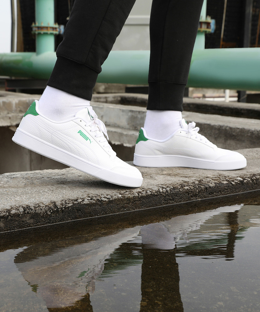 green puma sneakers