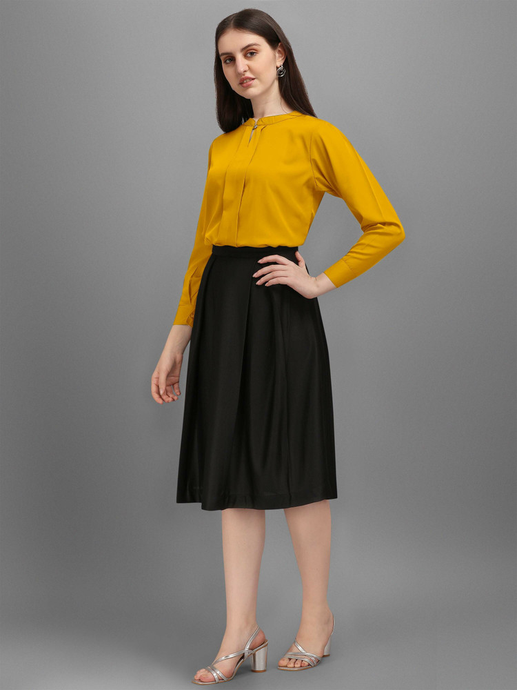 yellow skirt and black top